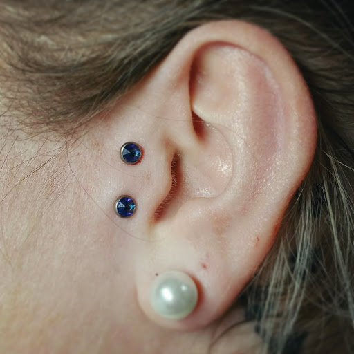 Explore tie dye tattoo ideas, creative tattoo ideas in Oswego, available at Bodified