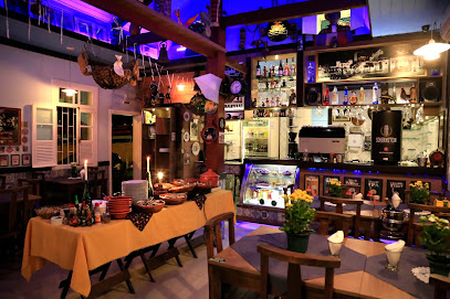 Logo da empresa - Manezinho Gastrobar