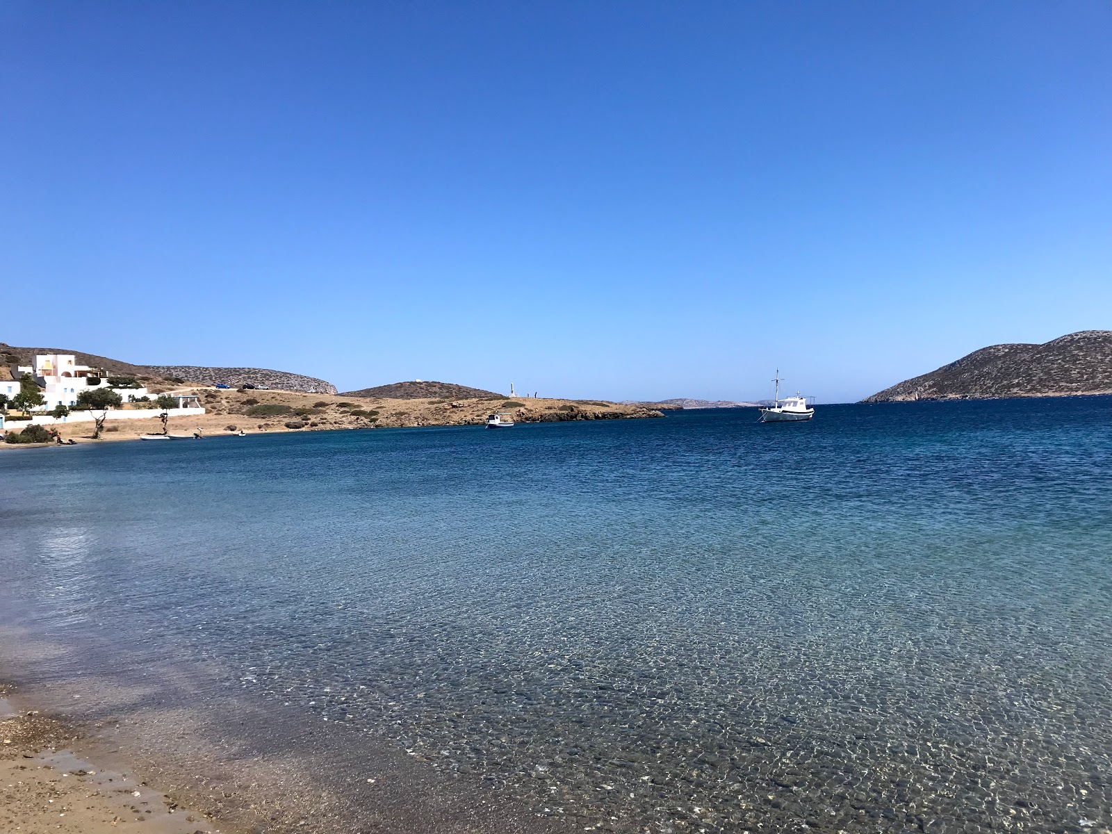 Photo of Schinoda Beach with blue pure water surface