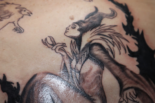 Explore lucky penny tattoo ideas, creative tattoo ideas in Spokane, available at Platinum Rose Tattoo Studio