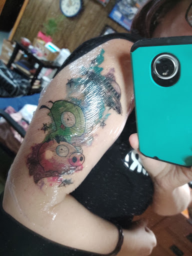 Explore 50th birthday tattoo ideas, creative tattoo ideas in Benton, available at Spectrum Tattoo