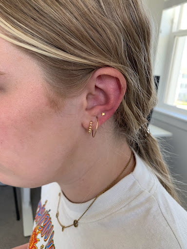 Explore tattoo ideas behind the ear, creative tattoo ideas in Orem, available at Pierced the Studio