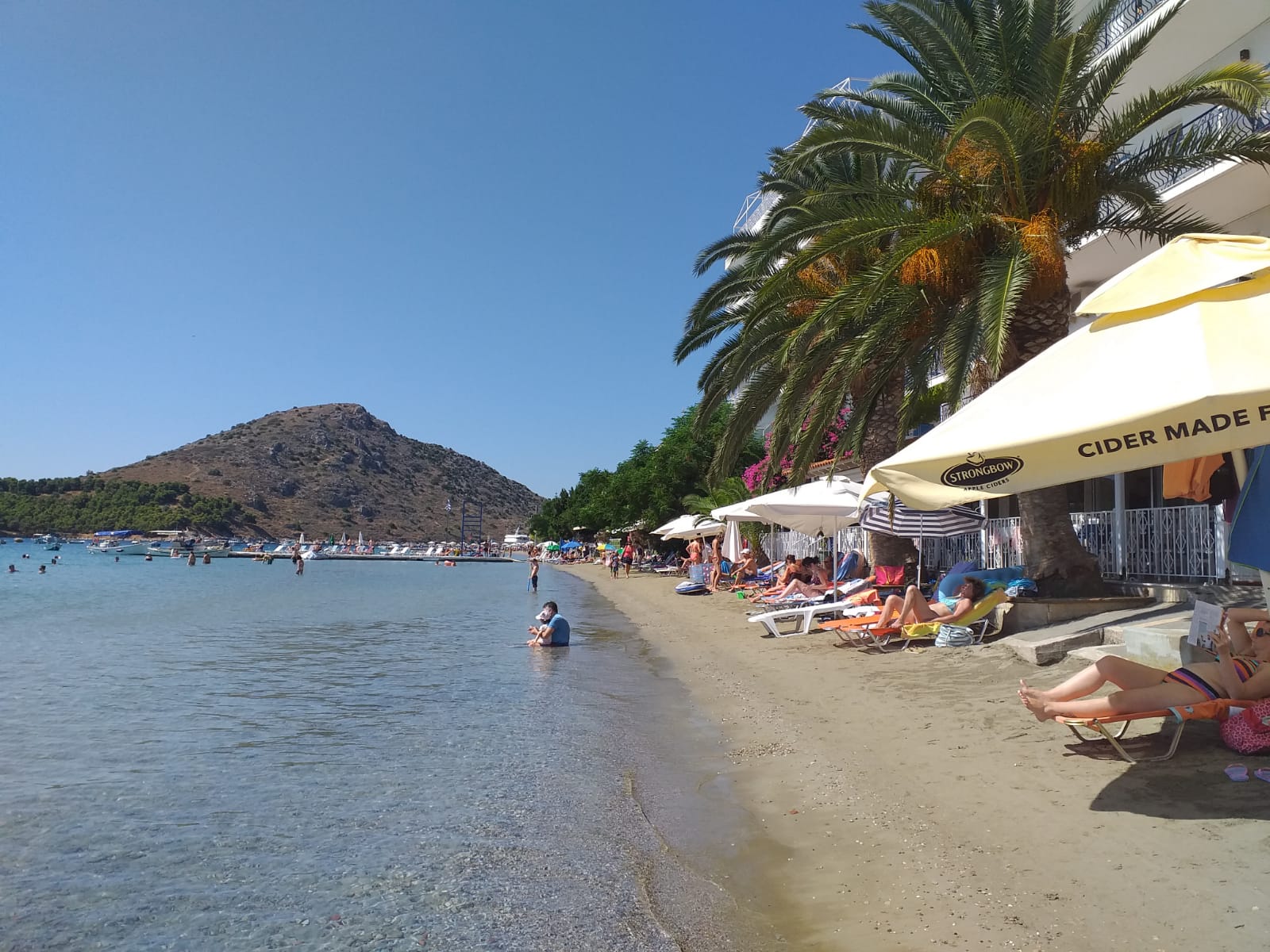 Zdjęcie Tolo Beach || z powierzchnią drobny brązowy piasek