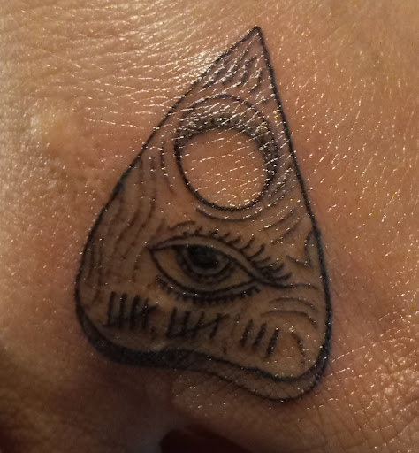 Find fishing tattoo ideas for your next unique tattoo in Peckville at The Chaotic Cauldron Tattoos and More