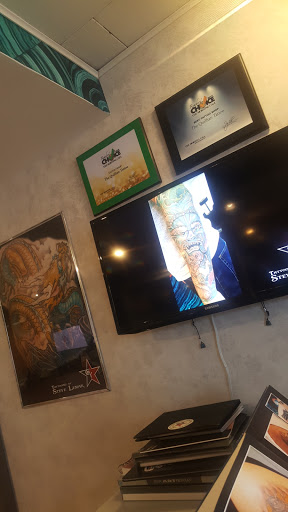 Explore blessed neck tattoo ideas, creative tattoo ideas in Allentown, available at Quillian Tattooing & Piercing