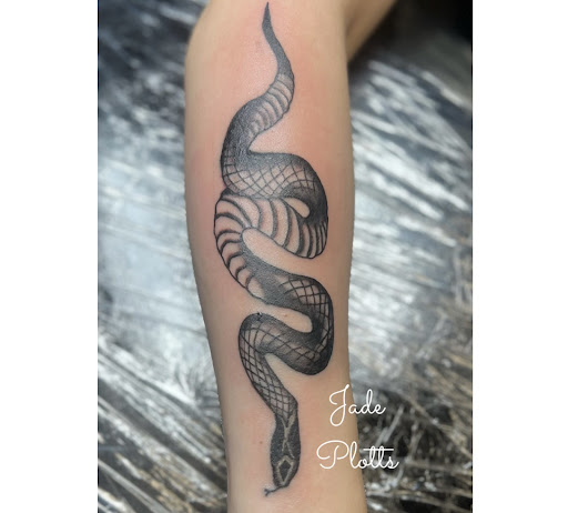 Explore tattoo ideas on leg for men, creative tattoo ideas in Lewisburg, available at Jolie Femme Permanent Makeup & Tiny Tattoos