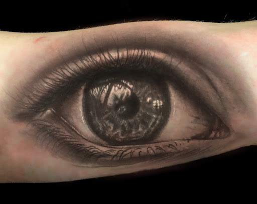 Explore evil clown tattoo ideas, creative tattoo ideas in Tea, available at Red Arbor Tattoo