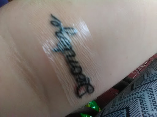 Tattoo Shop «Raining Ink», reviews and photos, 420 W 7th St, Columbia, TN 38401, USA