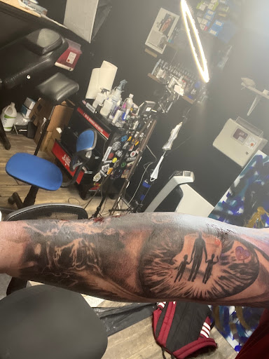 Explore feather tattoo ideas for men, creative tattoo ideas in Goose Creek, available at Red Kirin Tattoo