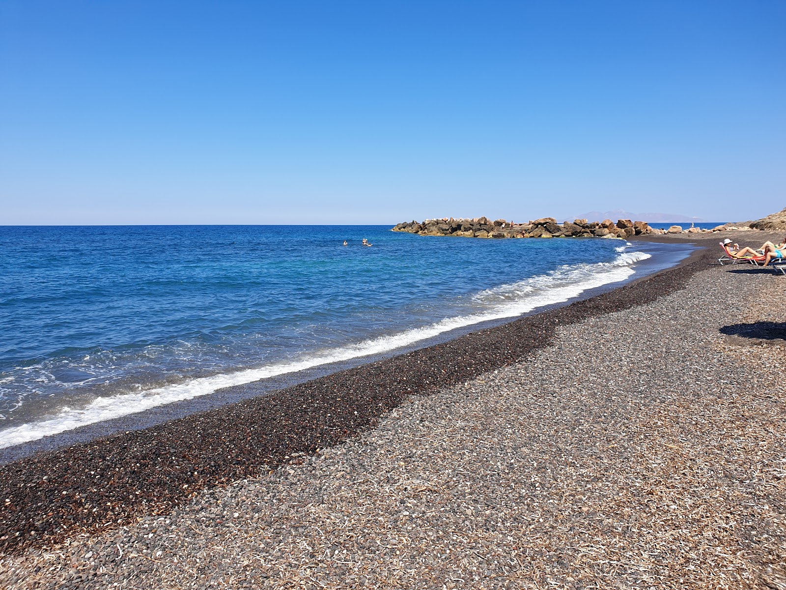 Foto di Monolithos beach con una superficie del #94