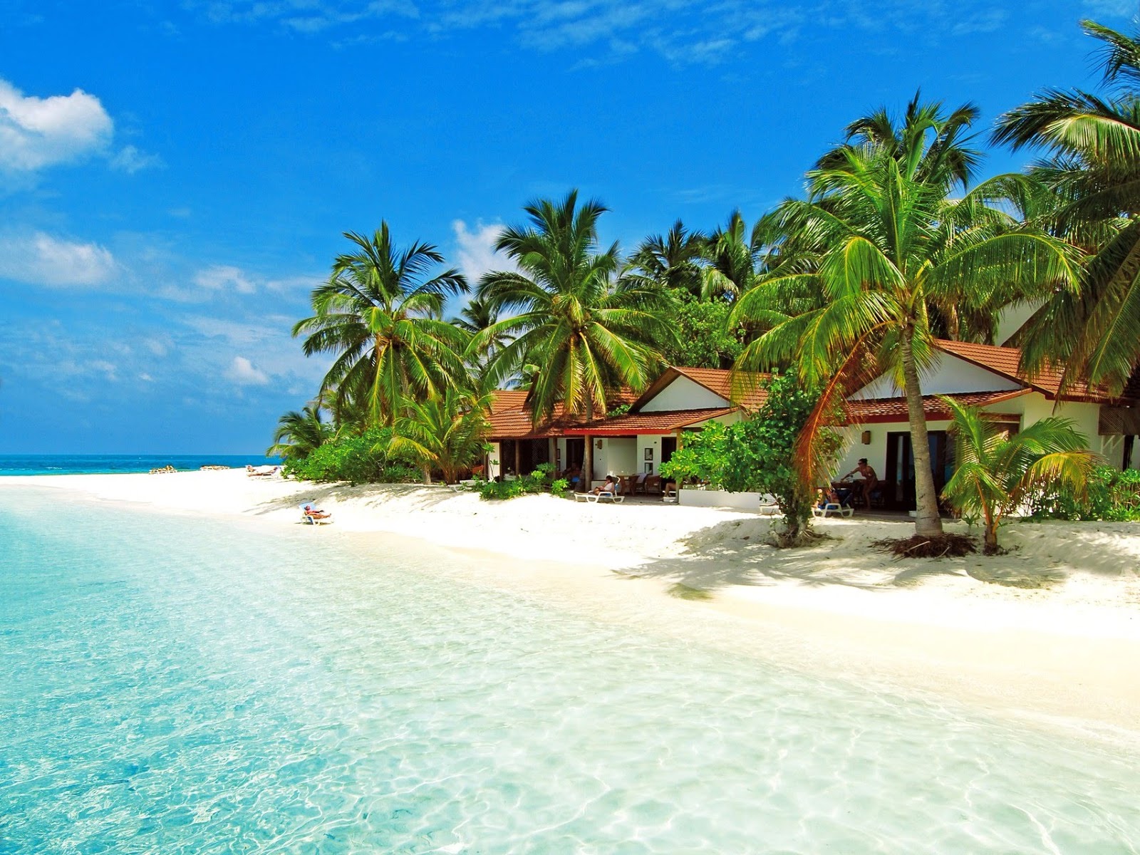 Foto van Diamonds Thudufushi met wit zand oppervlakte