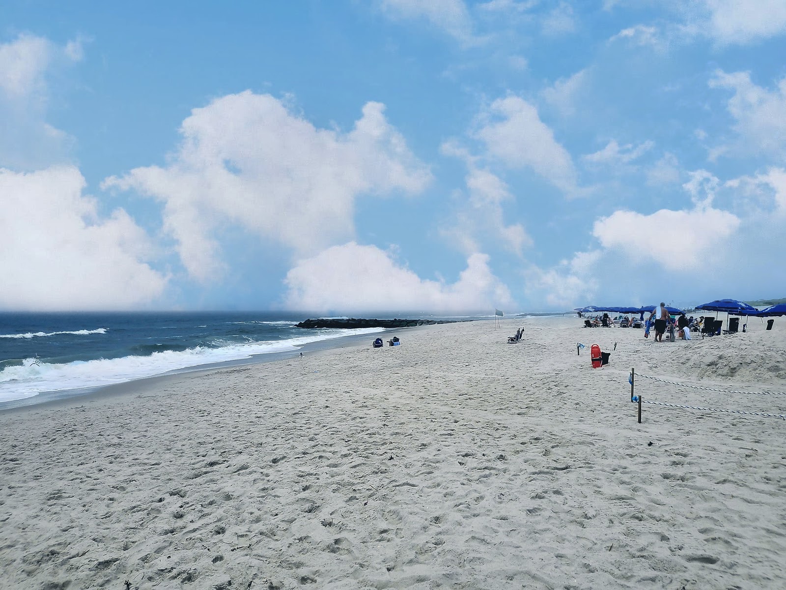 Foto van East Atlantic Beach met turquoise puur water oppervlakte