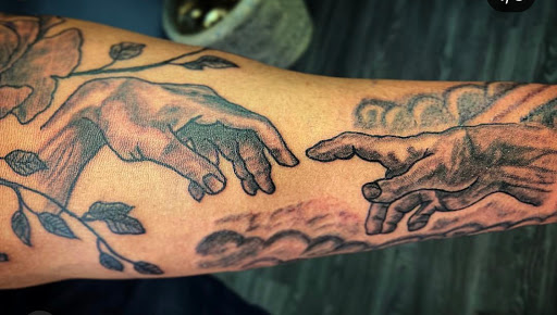 Explore muscle tattoo ideas, creative tattoo ideas in Sioux City, available at Maya Modification
