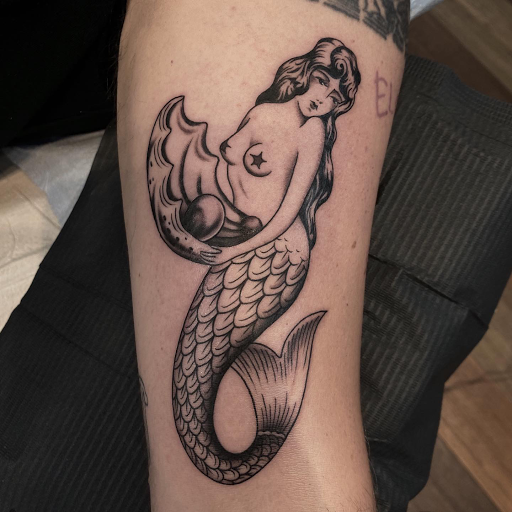 Explore beach tattoo ideas for ladies, creative tattoo ideas in Glenside, available at Iron Will Tattoo Club