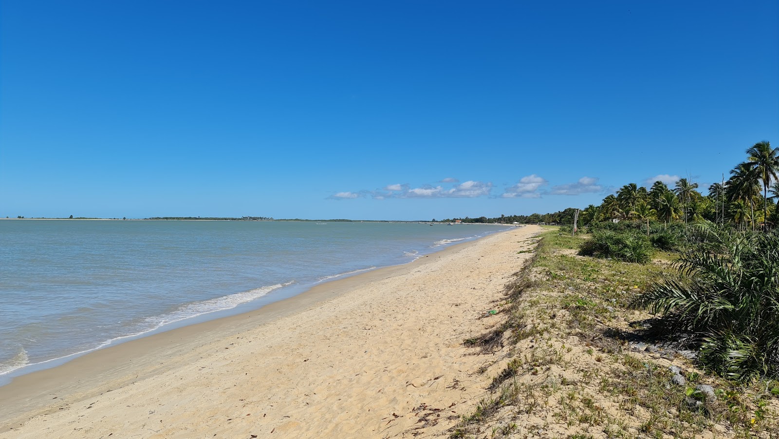 Foto de Grauca Beach con arena beige superficie