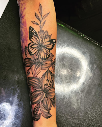 Explore moon tattoo ideas for females, creative tattoo ideas in Peoria, available at Modern Ink Tattoo