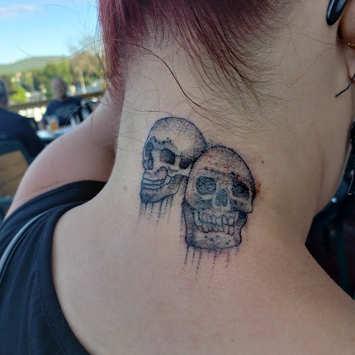 Explore little hand tattoo ideas, creative tattoo ideas in Lake George, available at Lake George Tattoo Company