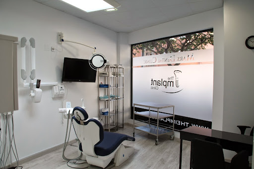 THE IMPLANT CLINIC
