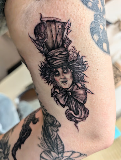 Explore mens cross tattoo ideas, creative tattoo ideas in Cornelia, available at Prismatic Pulse Tattoo