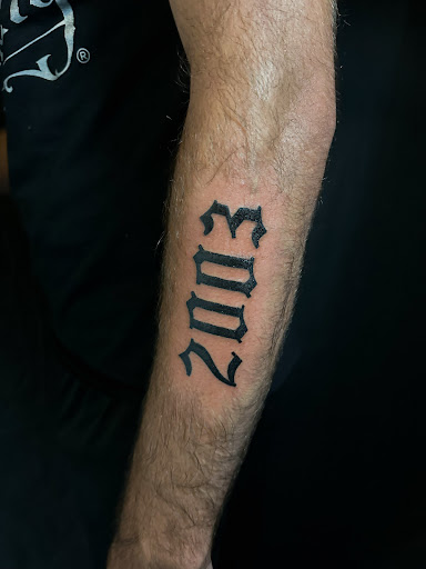 Explore kiss band tattoo ideas, creative tattoo ideas in Jacksonville, available at American Tattoo Society of Jacksonville