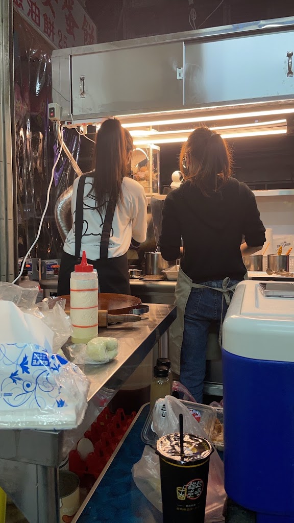 爆ㄎㄧㄤ 三重炸蛋蔥油餅 的照片