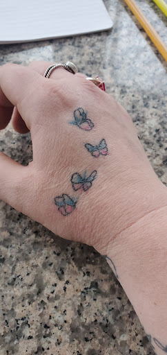 Explore tattoo ideas for arms and shoulders, creative tattoo ideas in Laconia, available at Circus Tattoo