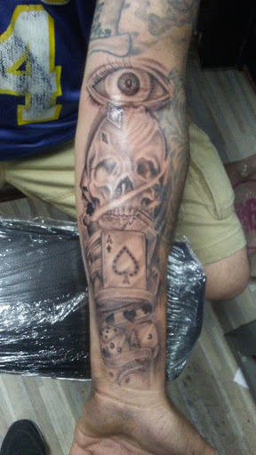 Explore tattoo ideas tribal arm, creative tattoo ideas in Los Angeles, available at South Central Tattoos