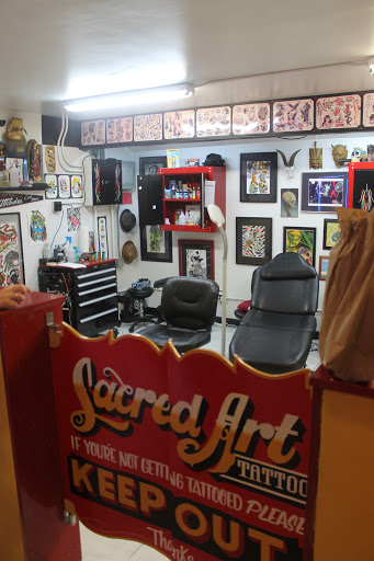 Explore iris flower tattoo ideas, creative tattoo ideas in Honolulu, available at Sacred Art Tattoo Waikiki