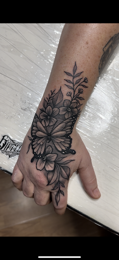 Find small heart tattoo ideas for your next unique tattoo in Williamsport at Tats Tattoo Zoo