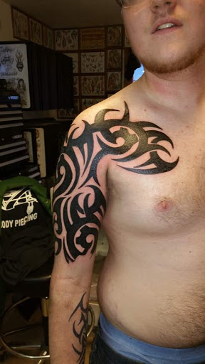 Explore clock tattoo ideas for females, creative tattoo ideas in Elko, available at Tom Custom Tattoos and Body Piercing Studio