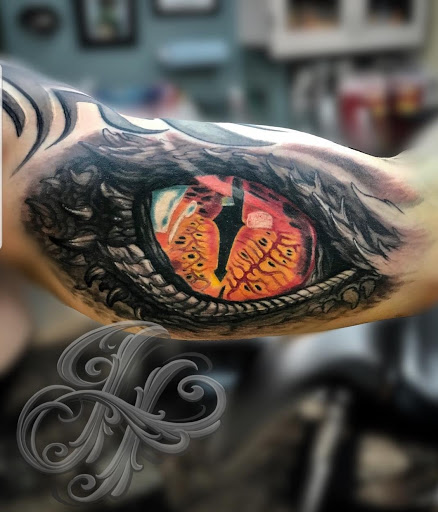 Explore pisces tattoo ideas for woman, creative tattoo ideas in Rochester, available at Sacred Heart Studios