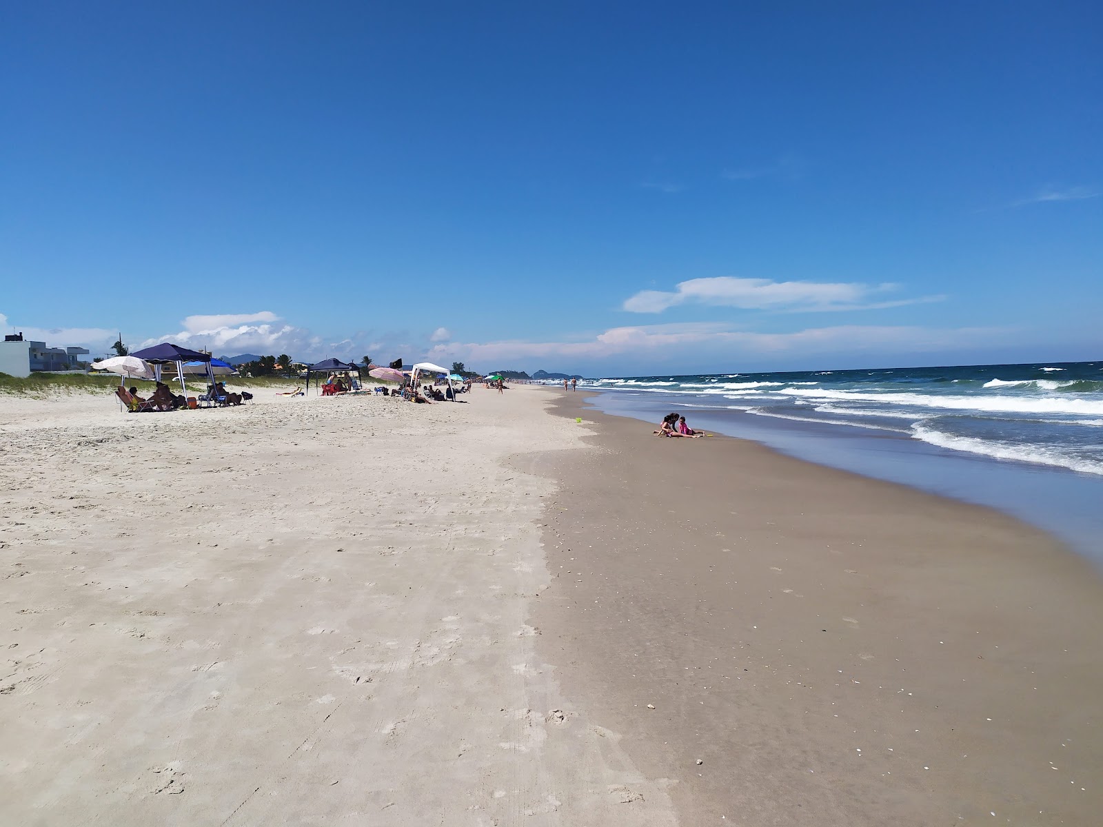 Foto van Figueira Beach met helder fijn zand oppervlakte