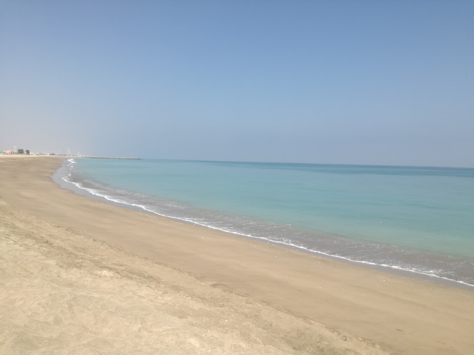 Fotografija Kalba Beach z svetel pesek površino