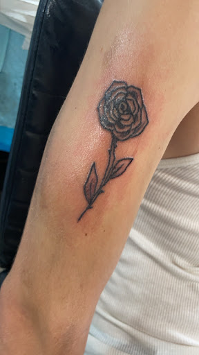 Find small sun tattoo ideas for your next unique tattoo in Cranston at Kabloom Tattoo Studio