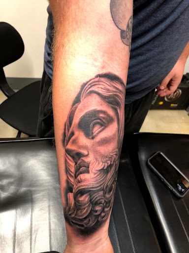 Explore dog tattoos ideas, creative tattoo ideas in Atlanta, available at Empyrean Tattoo Studio