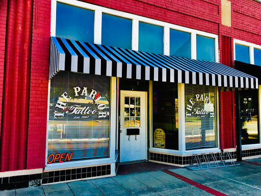 Find best women's tattoo ideas for your next unique tattoo in North Little Rock at The Parlor Tattoo