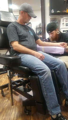 Explore firefighter sleeve tattoo ideas, creative tattoo ideas in Pigeon Forge, available at Black Orchid Tattoo Studio