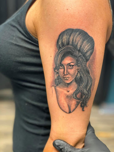 Explore top of hand tattoo ideas, creative tattoo ideas in Goose Creek, available at Red Kirin Tattoo