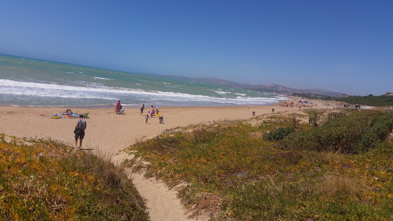 Fotografija Cannatello beach z svetel pesek površino