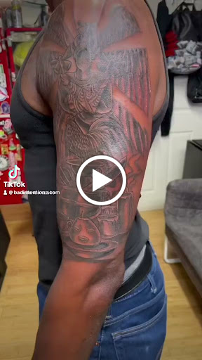 Explore tattoo cuff ideas, creative tattoo ideas in Newark, available at Bad Intentionz Tattoo & Piercings Studio