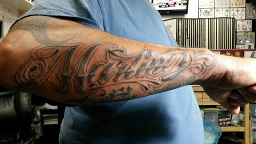 Explore alligator tattoo ideas, creative tattoo ideas in Tucson, available at Tattoo Azteca Inc