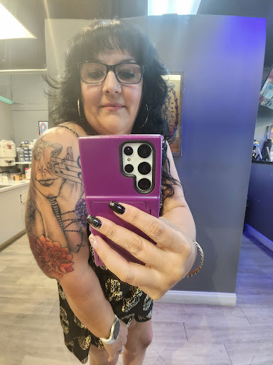 Explore feminine leg tattoo ideas, creative tattoo ideas in Lakeland, available at Lyons Den Tattoo Company