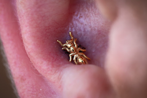 Explore money tattoo ideas, creative tattoo ideas in Terre Haute, available at Piercings by Brett Rice - godpiercethequeen