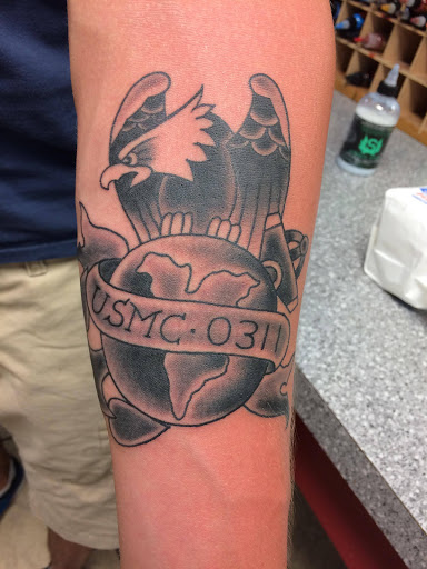 Explore husband name tattoo ideas for wife, creative tattoo ideas in Powell, available at Against All Odds Tattoos and Piercings