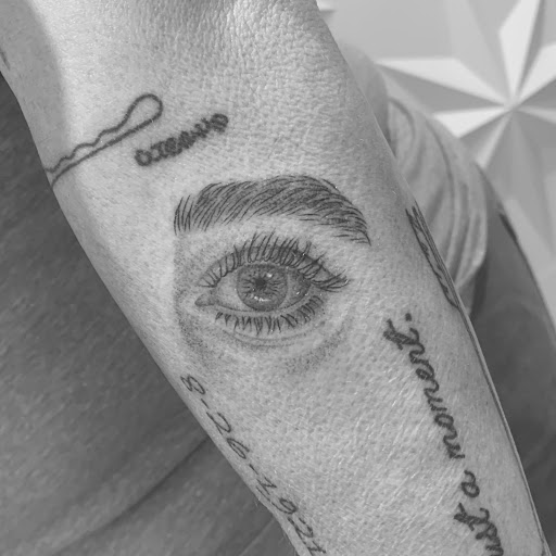 Explore tattoo ideas black people, creative tattoo ideas in Fairfax, available at Pinky Inky Tattoo