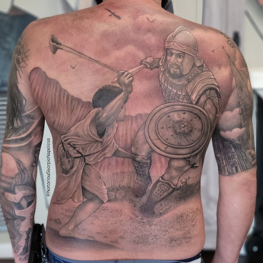 Explore patriotic sleeve tattoo ideas, creative tattoo ideas in Winter Haven, available at Angry Elephant Tattoos Winter Haven