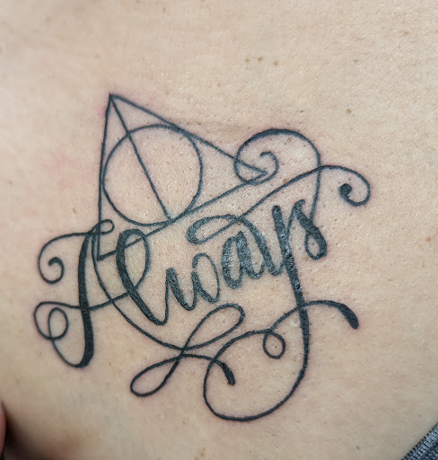 Explore tattoo half sleeve ideas tribal, creative tattoo ideas in Madisonville, available at Living Art Tattoo & Piercing Studio