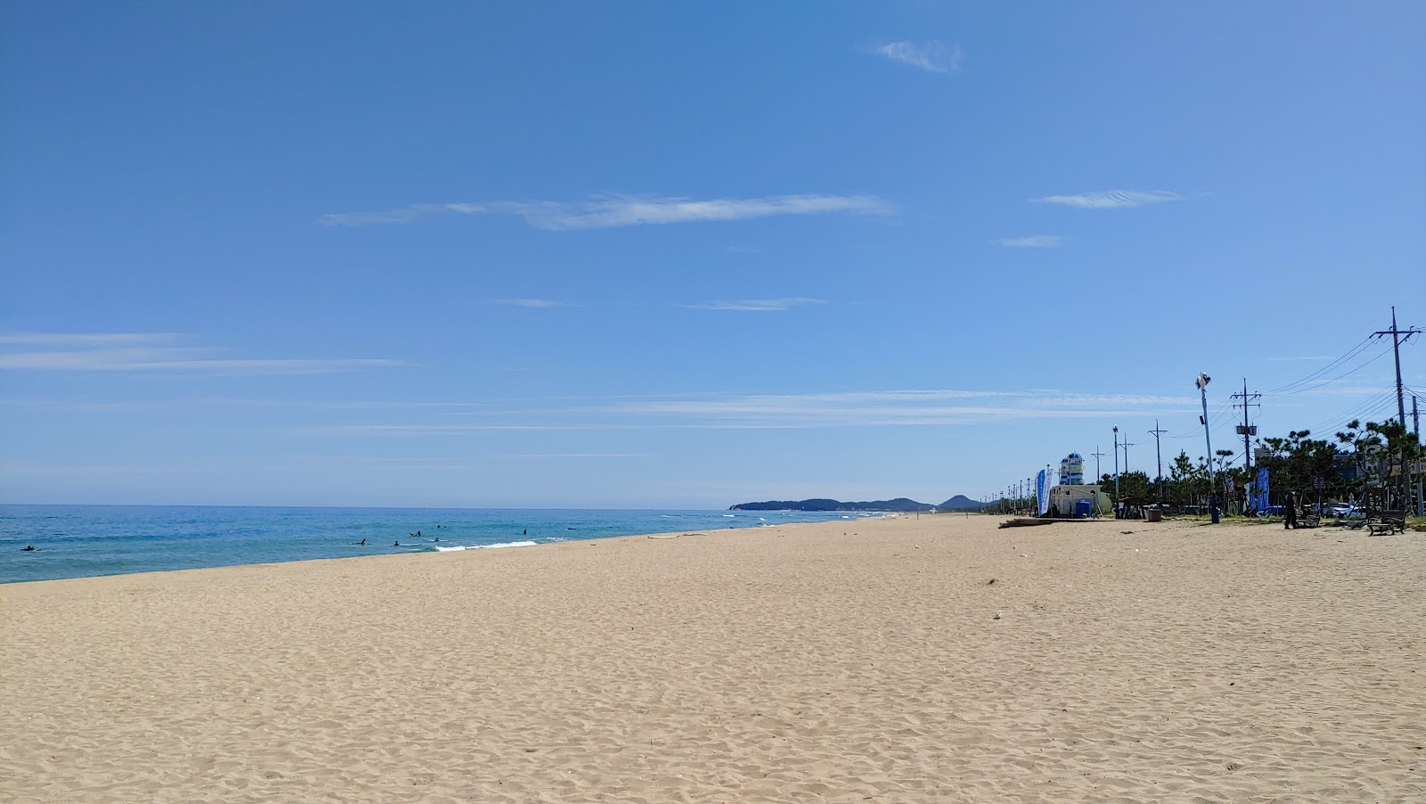 Valokuva Dongho Beachista. mukavuudet alueella