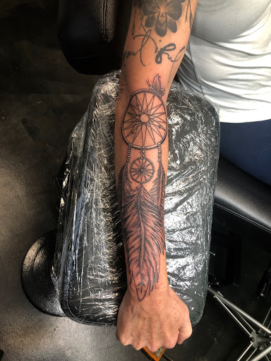 Explore switzerland tattoo ideas, creative tattoo ideas in Meridian, available at Creative Pain Tattoo Studio