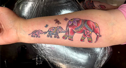 Explore tattoo ideas for female sleeve, creative tattoo ideas in Meridian, available at Creative Pain Tattoo Studio